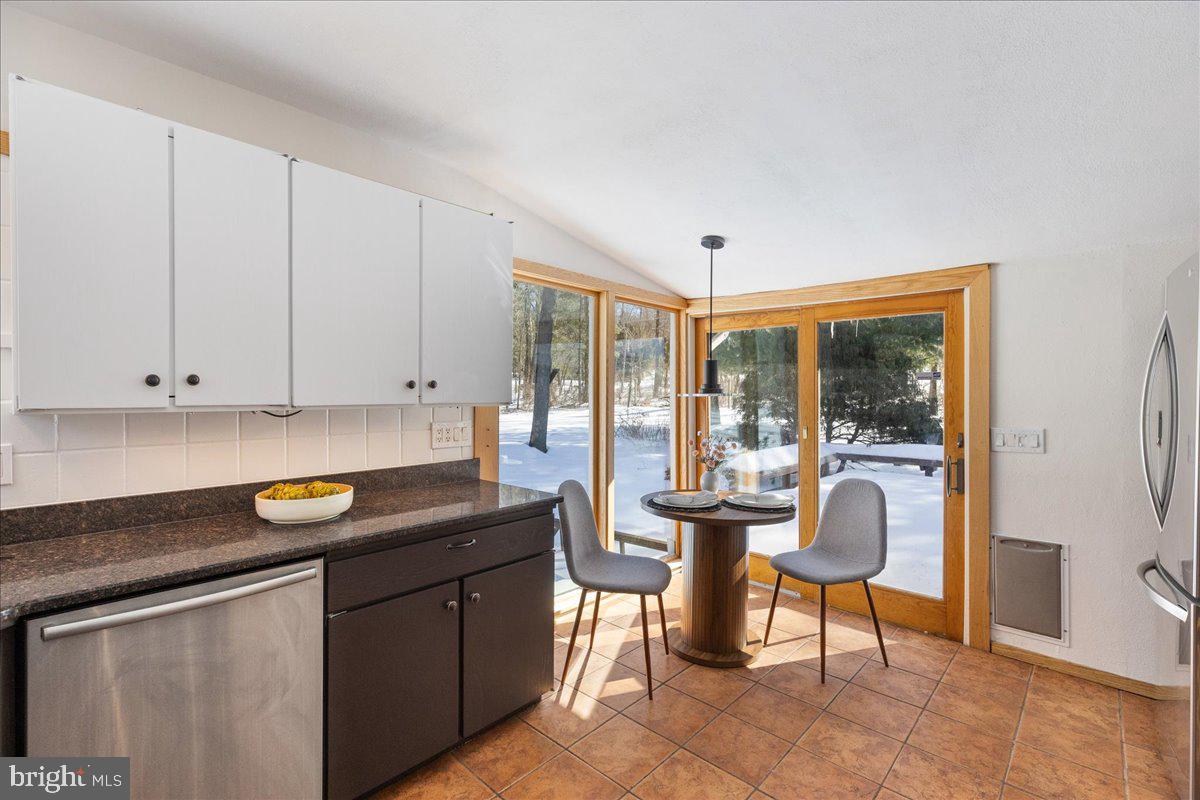 165 Heather Lane Princeton, NJ 08540 - Photo 13 of 28 a kitchen with a sink and cabinets