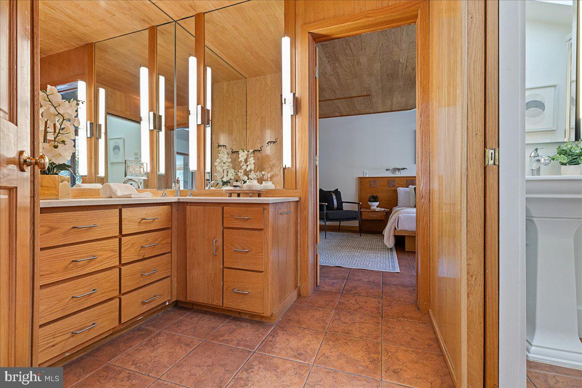 165 Heather Lane Princeton, NJ 08540 - Photo 14 of 28 a room with a bed and a large window