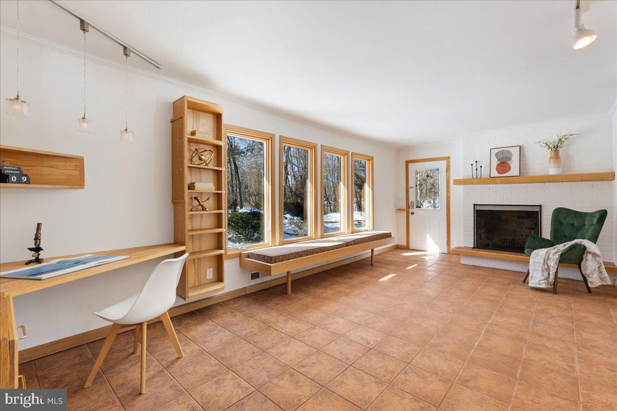 165 Heather Lane Princeton, NJ 08540 - Photo 18 of 28 a living room with furniture and a fireplace