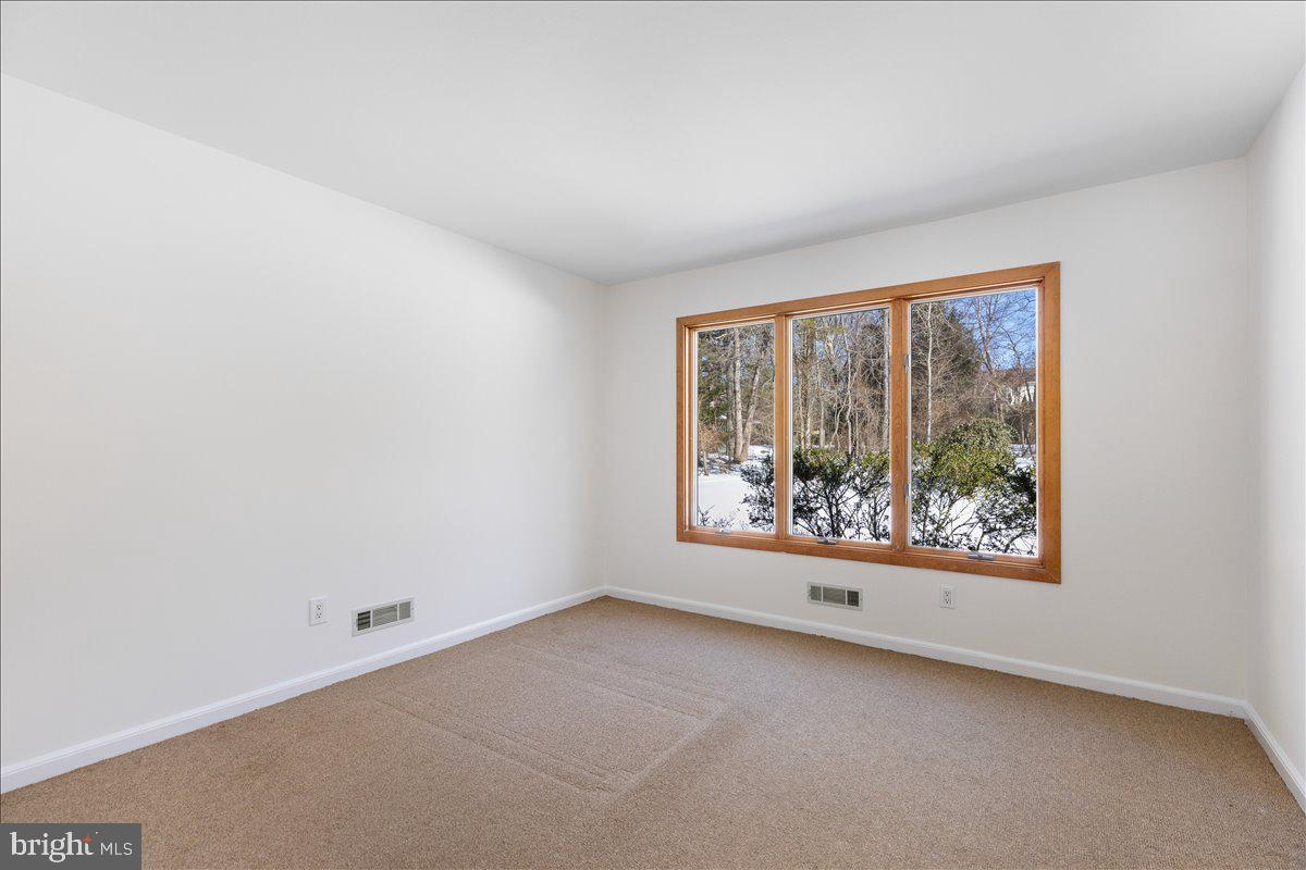 165 Heather Lane Princeton, NJ 08540 - Photo 22 of 28 an empty room with windows