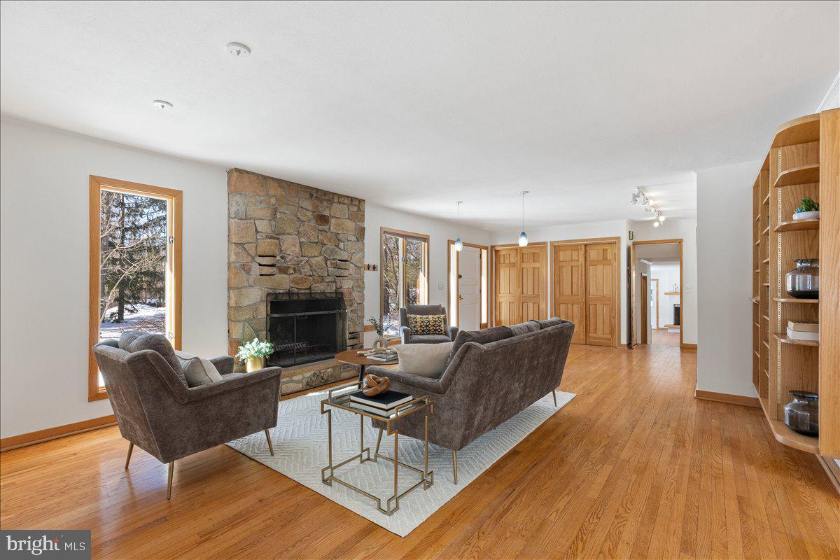 165 Heather Lane Princeton, NJ 08540 - Photo 4 of 28 a living room with furniture and a fireplace