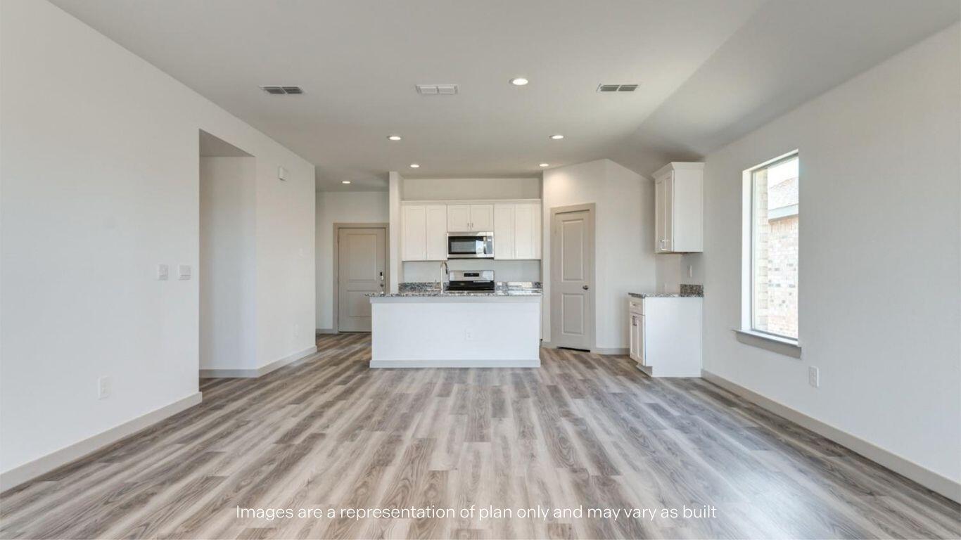 2234 150th Place Lubbock, TX 79423 - Photo 7 of 22 a view of kitchen with wooden floor and electronic appliances