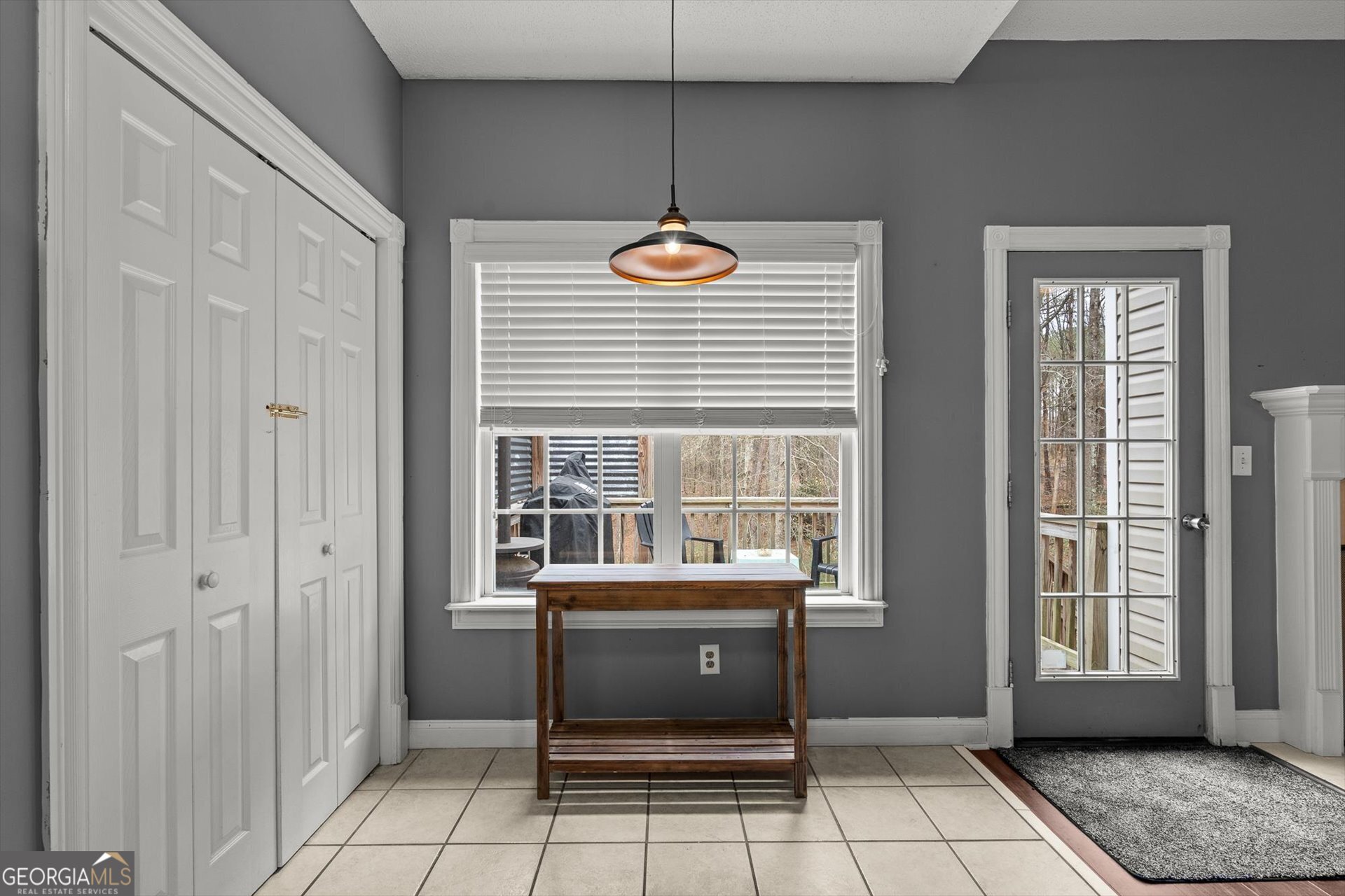 238 James Allen Place Temple, GA 30179 - Photo 12 of 42 a dining room with a window and chairs