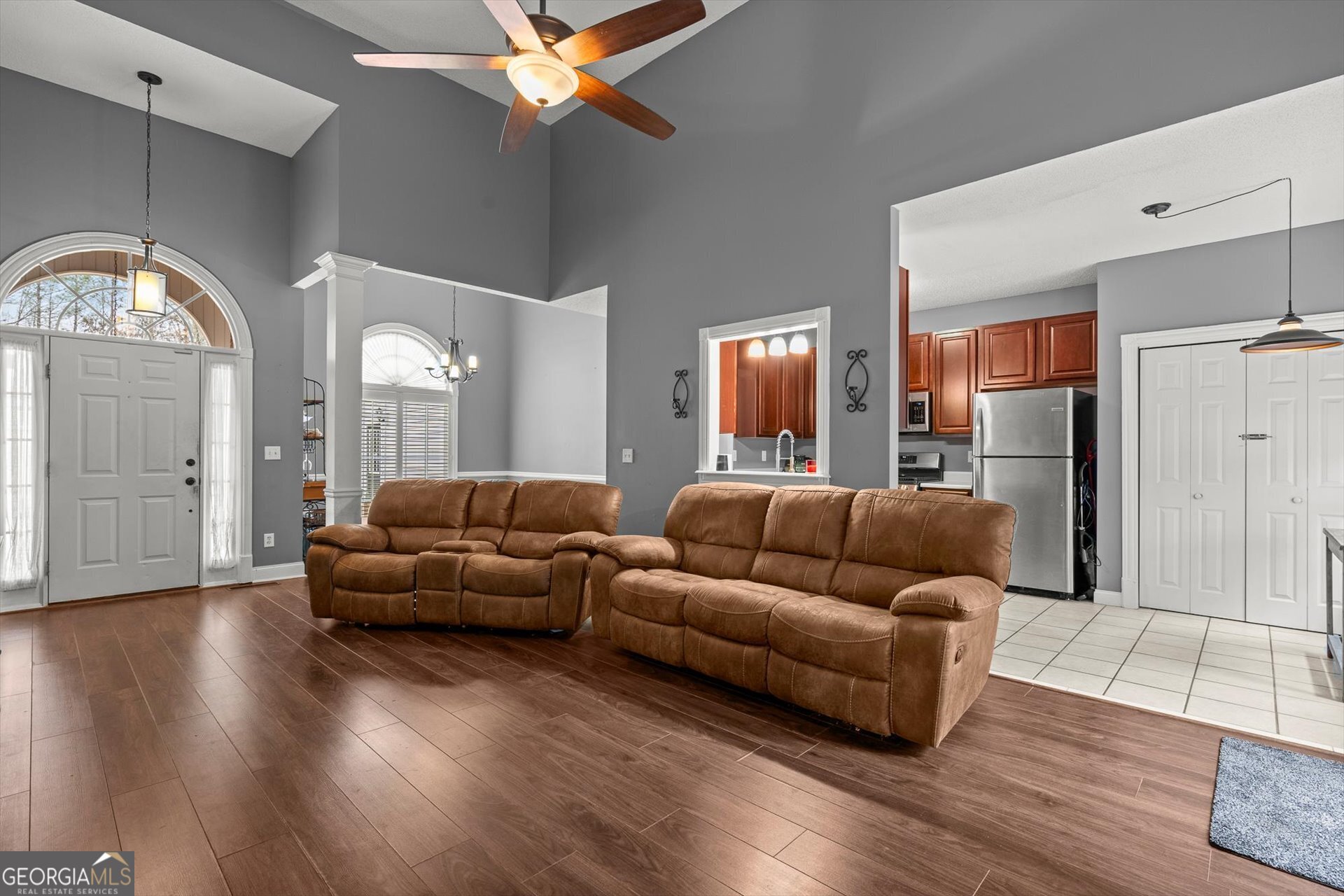 238 James Allen Place Temple, GA 30179 - Photo 12 of 43 a living room with furniture and a wooden floor