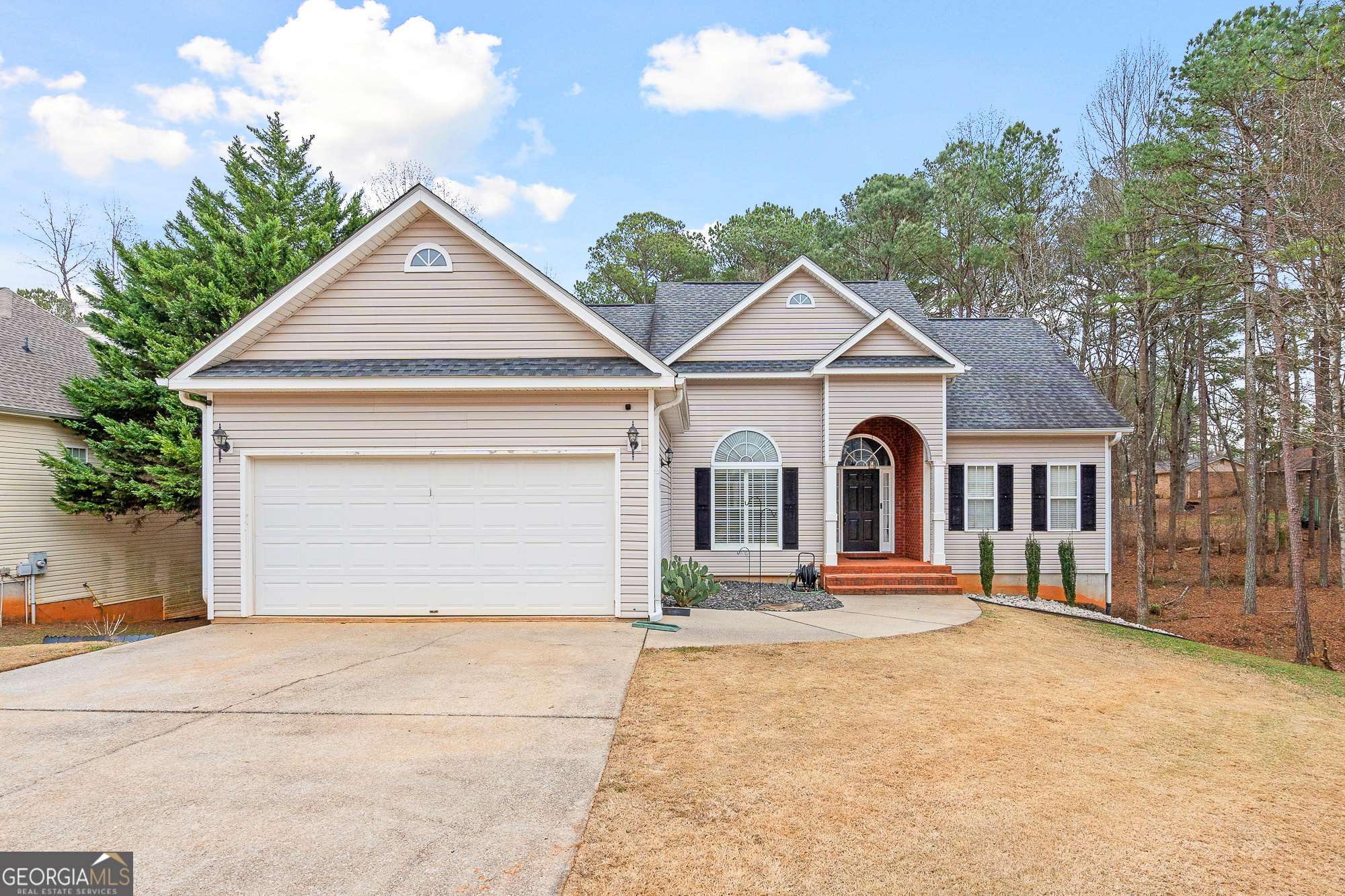 238 James Allen Place Temple, GA 30179 - Photo 2 of 42 a front view of a house with a yard