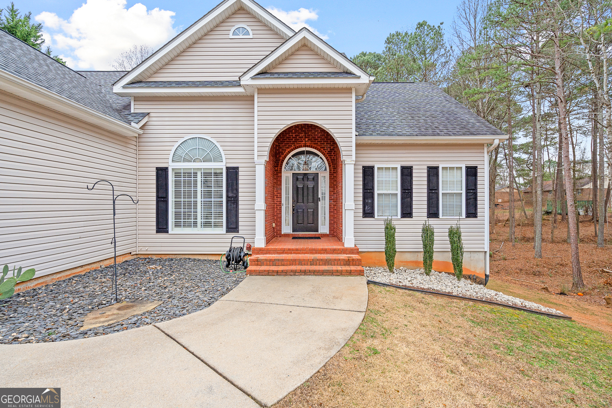 238 James Allen Place Temple, GA 30179 - Photo 3 of 42 a front view of a house with a yard