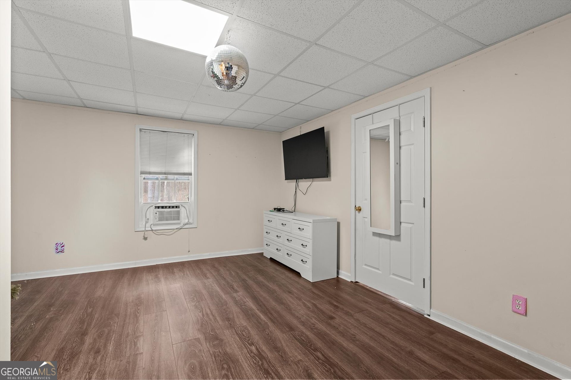 238 James Allen Place Temple, GA 30179 - Photo 36 of 43 a view of an empty room with a window and wooden floor