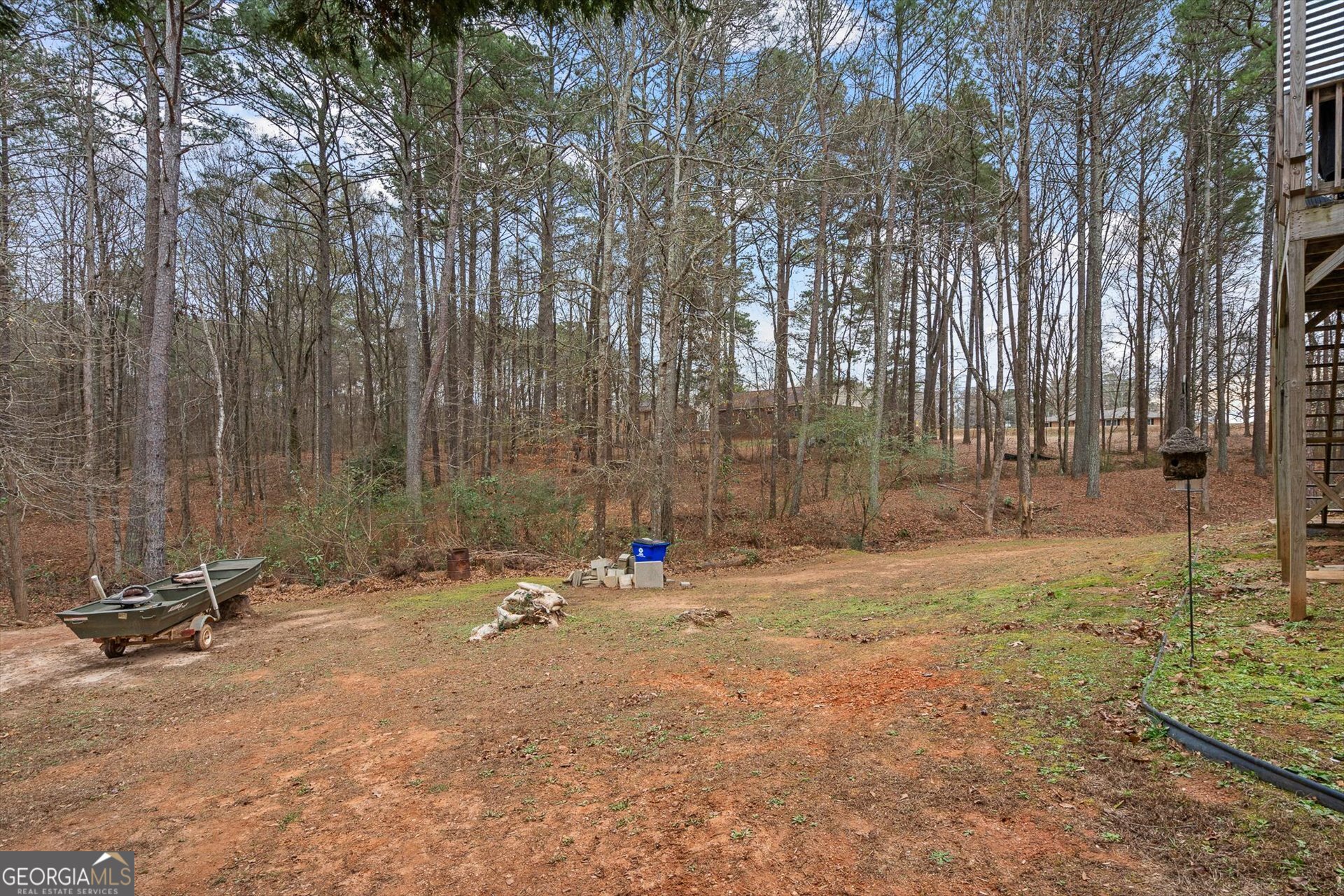 238 James Allen Place Temple, GA 30179 - Photo 42 of 42 a view of outdoor space with deck and trees