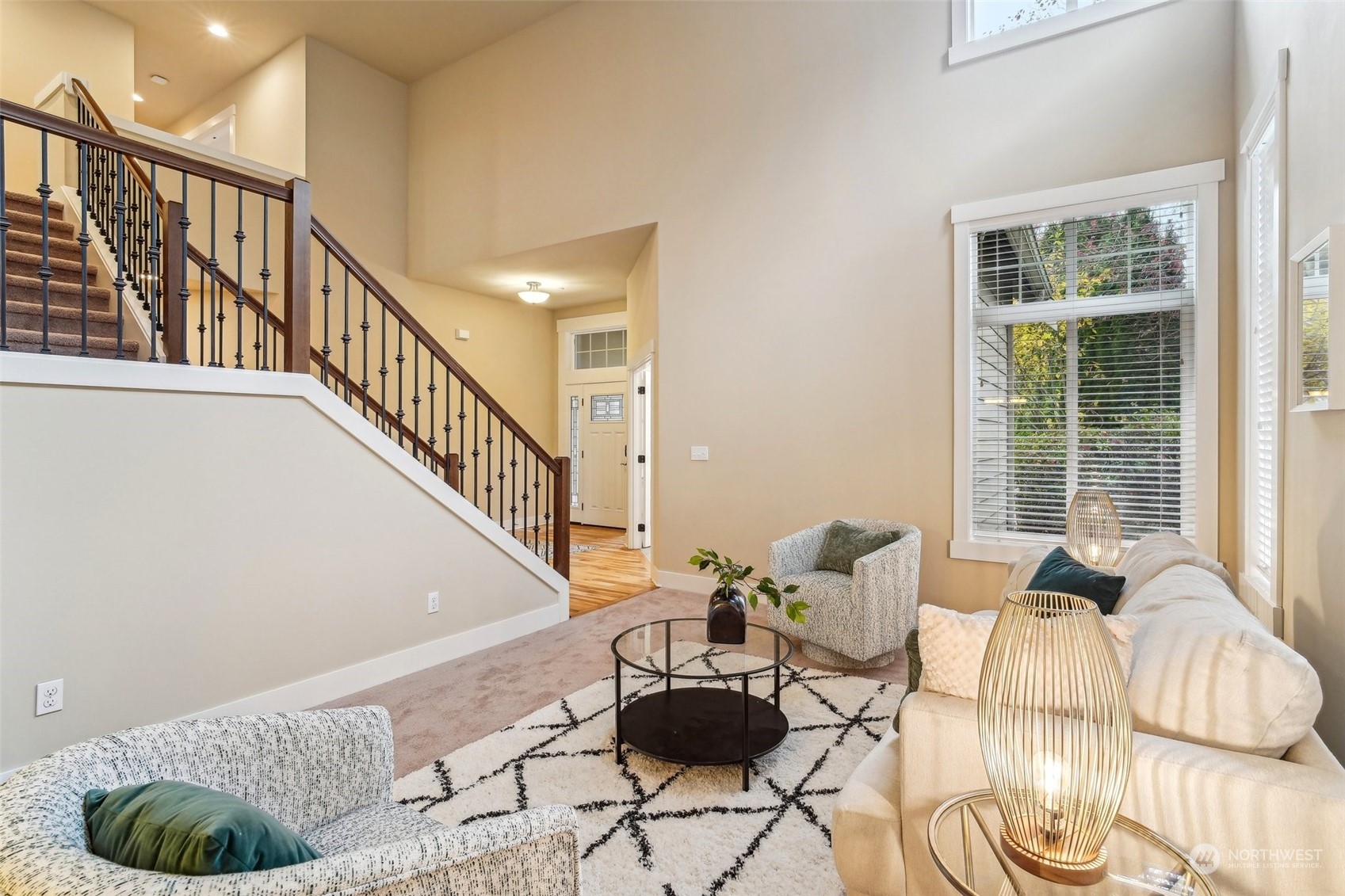 3122 223rd Street Southeast Bothell, WA 98021 - Photo 6 of 36 a living room with furniture and a potted plant