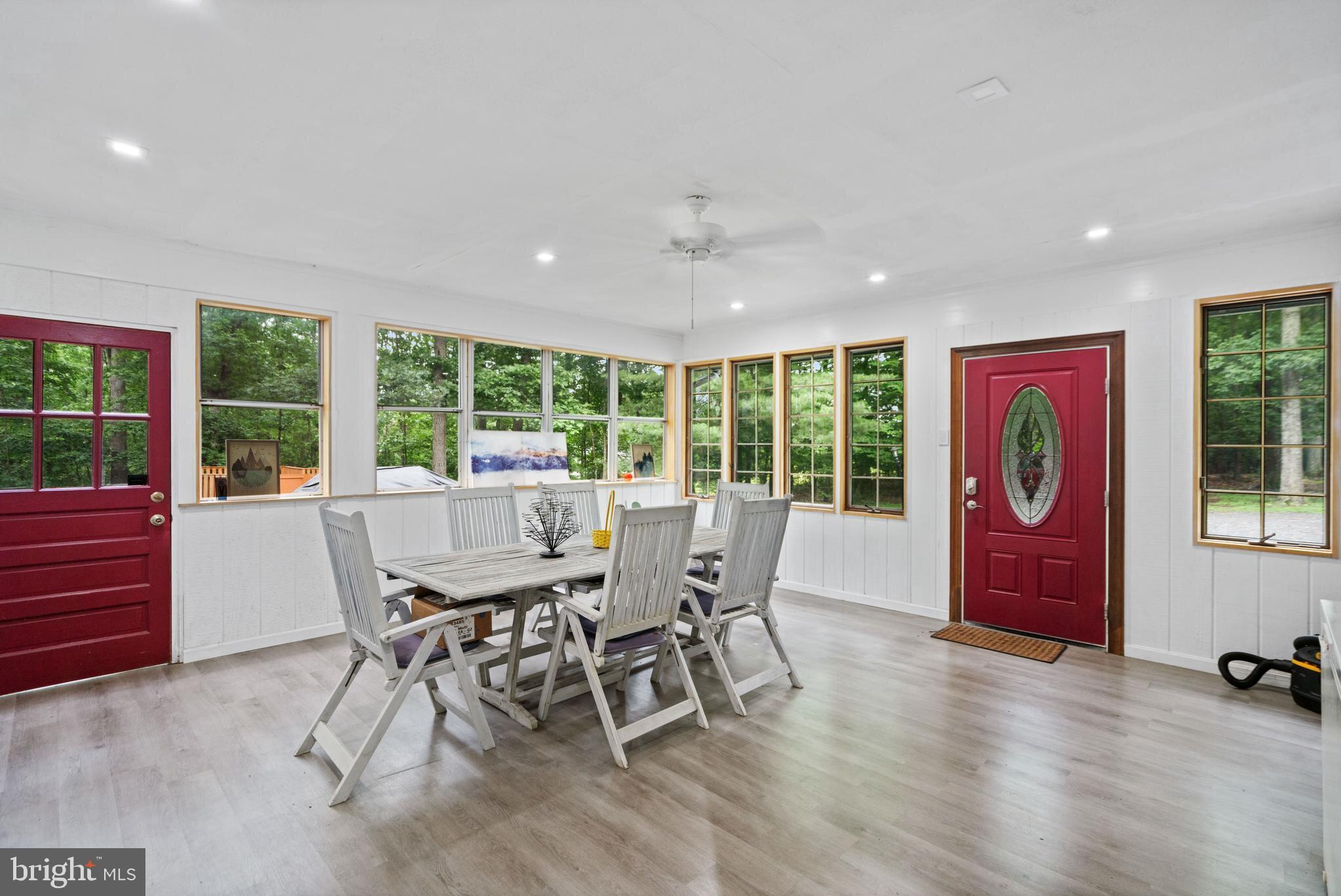 265 Slate Lane Stephenson, VA 22656 - Photo 11 of 29 a view of a dining room with furniture window and outside view