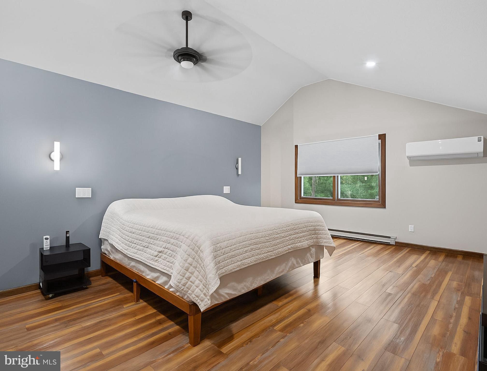 265 Slate Lane Stephenson, VA 22656 - Photo 13 of 29 a bedroom with a bed and a window