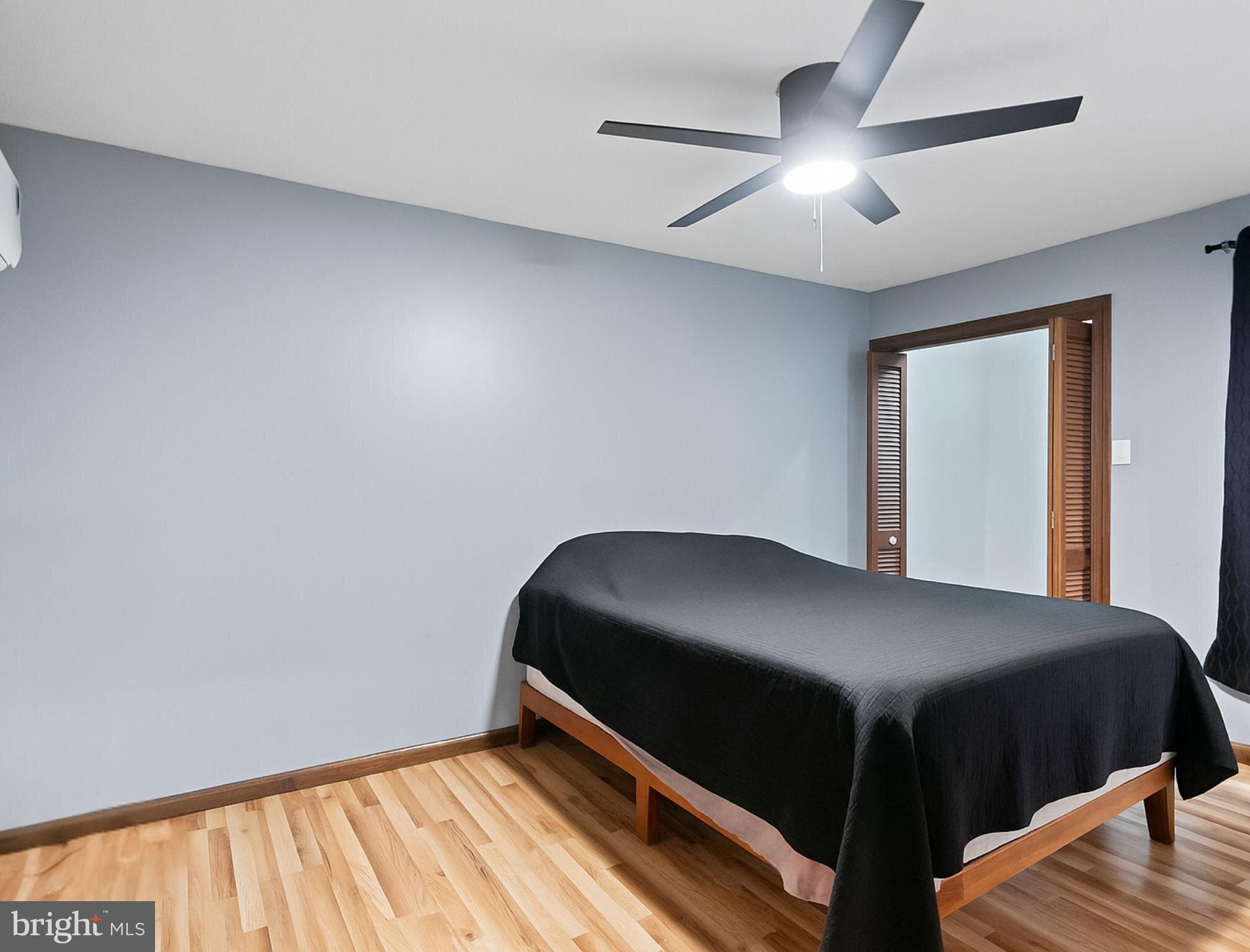 265 Slate Lane Stephenson, VA 22656 - Photo 17 of 29 a bedroom with a bed and a window