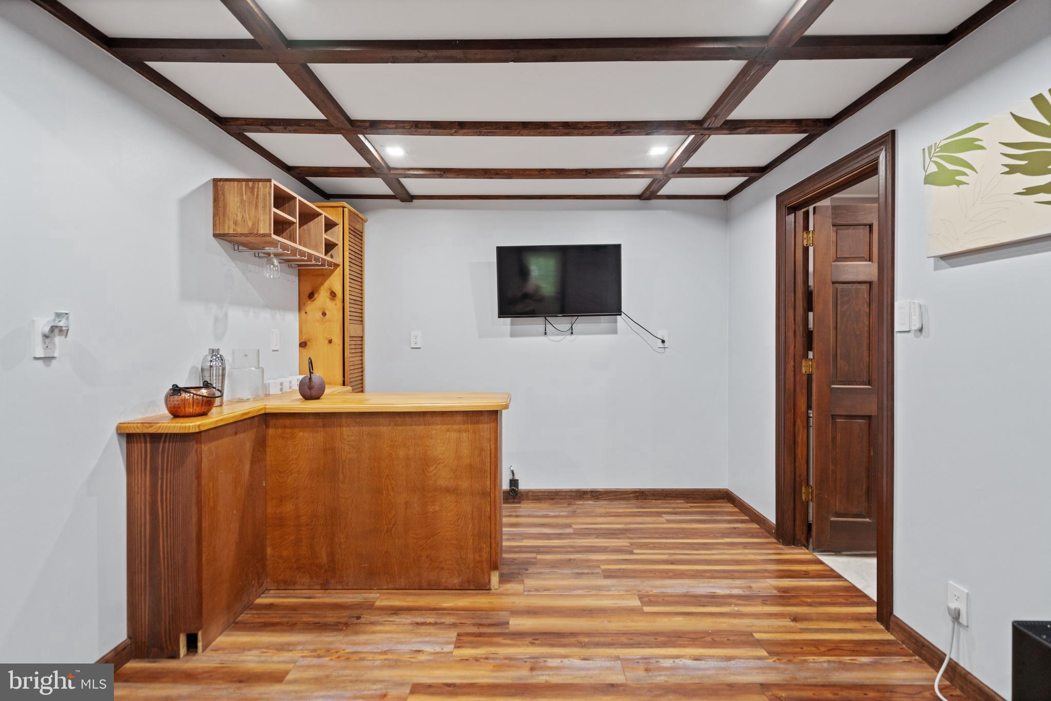 265 Slate Lane Stephenson, VA 22656 - Photo 21 of 29 a view of a livingroom with wooden floor and a hallway