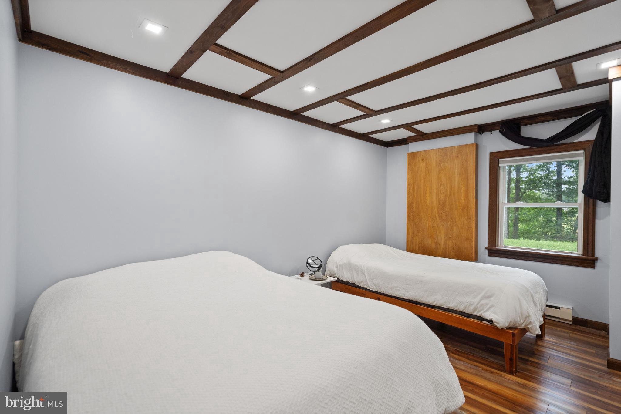 265 Slate Lane Stephenson, VA 22656 - Photo 23 of 29 a bedroom with a bed and a window