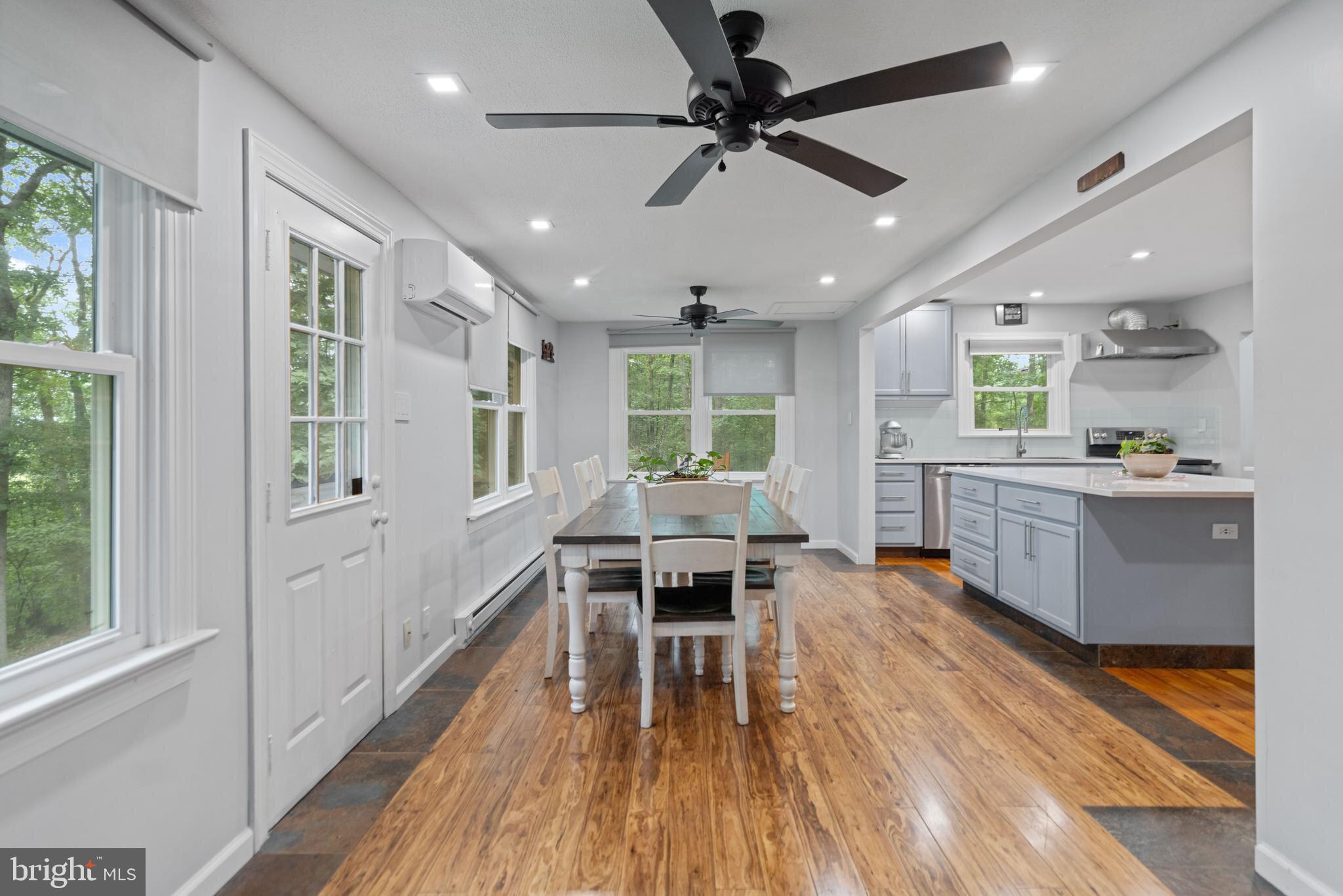 265 Slate Lane Stephenson, VA 22656 - Photo 6 of 29 a living room with furniture and a wooden floor