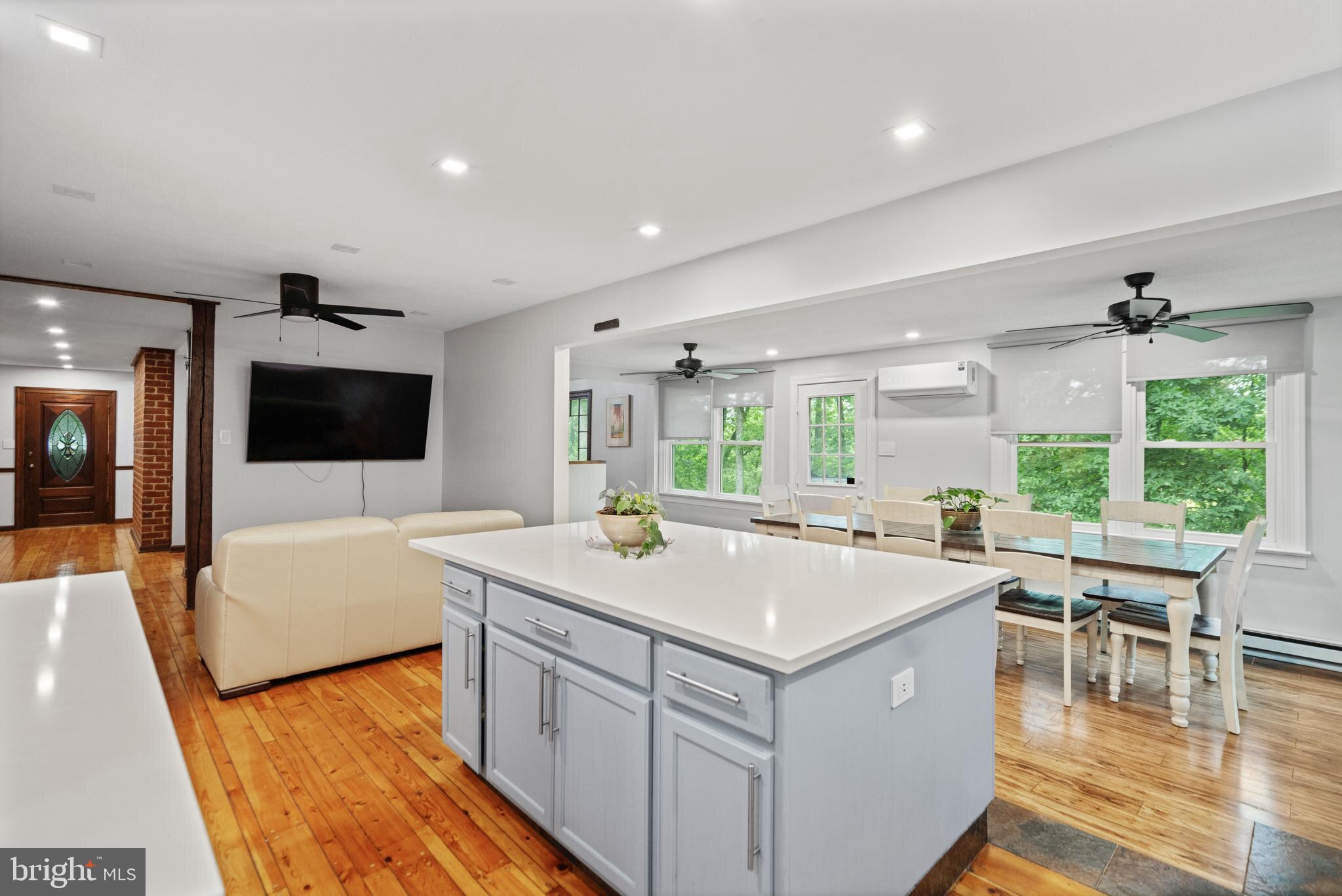 265 Slate Lane Stephenson, VA 22656 - Photo 8 of 29 a very nice looking living room with a large window and a flat screen tv