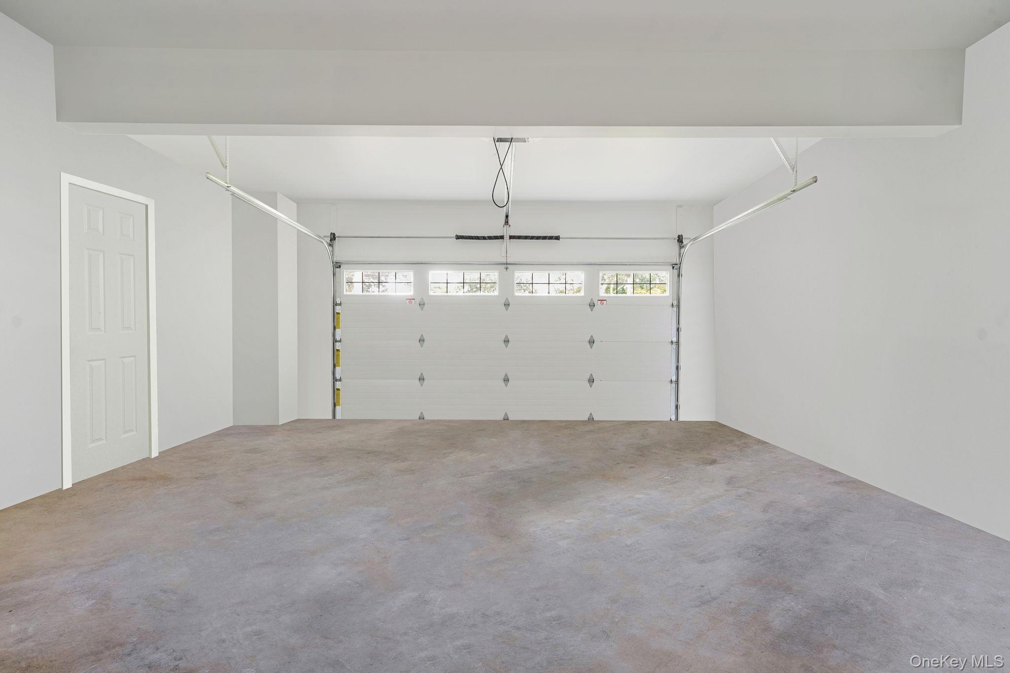 122 4th Street St. James, NY 11780 - Photo 32 of 36 an empty room with chandelier fan