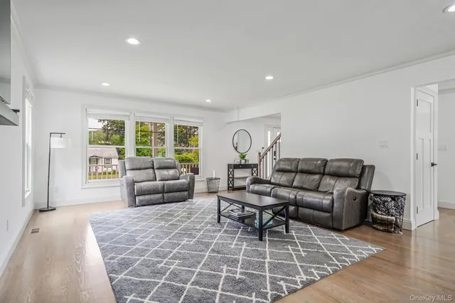 a living room with furniture and a couch