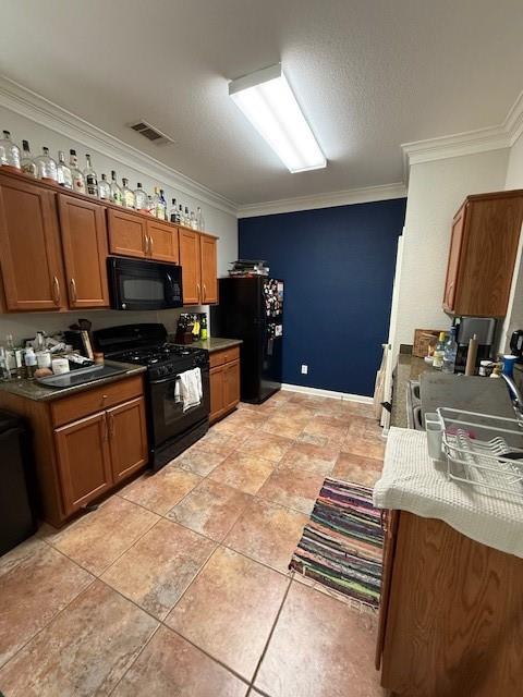 2513 South 2nd Street, Unit 3 Waco, TX 76706 - Photo 11 of 35 a kitchen with granite countertop a stove and a sink