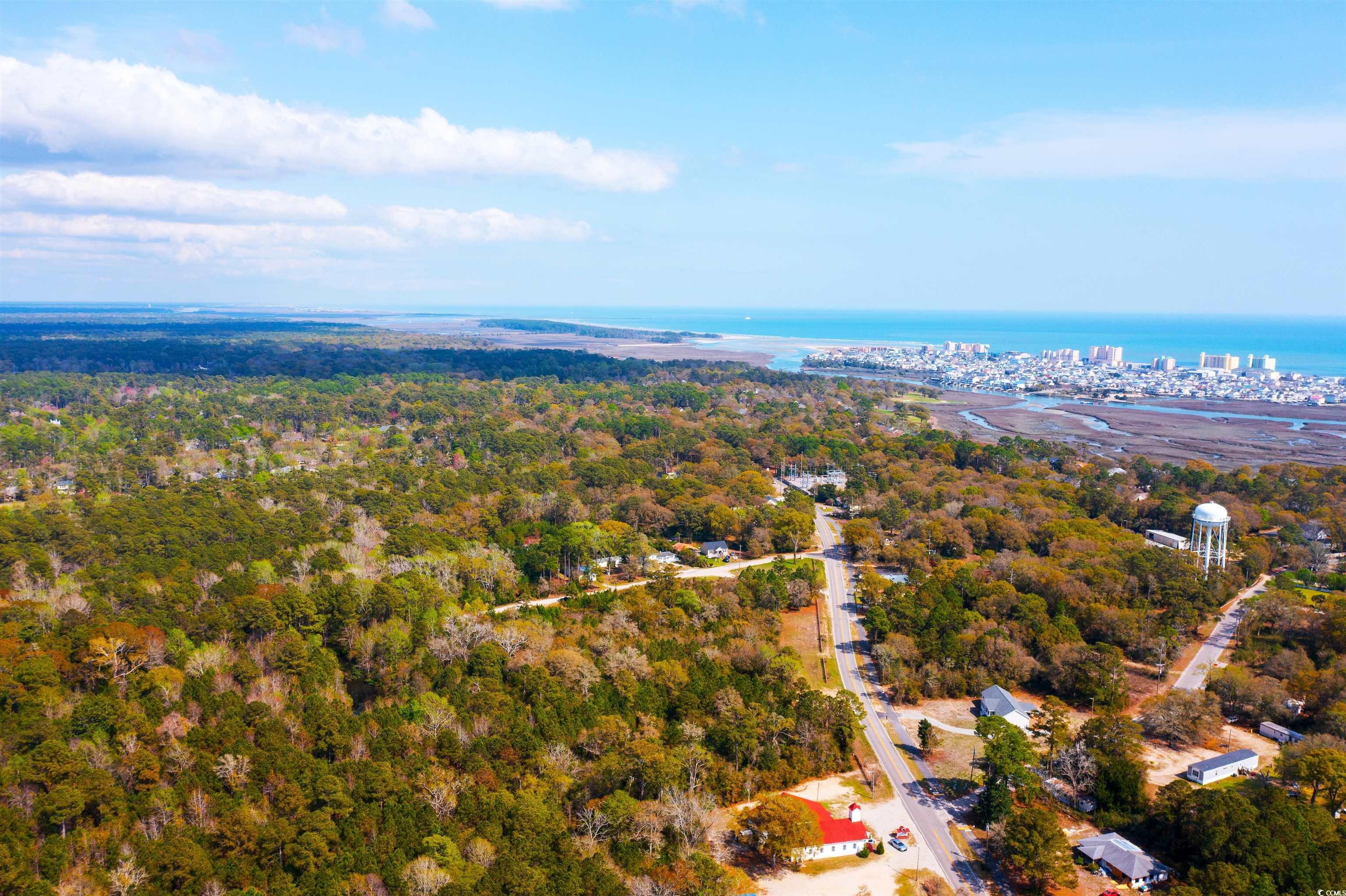 4675 Little River Neck Road North Myrtle Beach, SC 29582 - Photo 11 of 23 Birds eye view of property with a water view