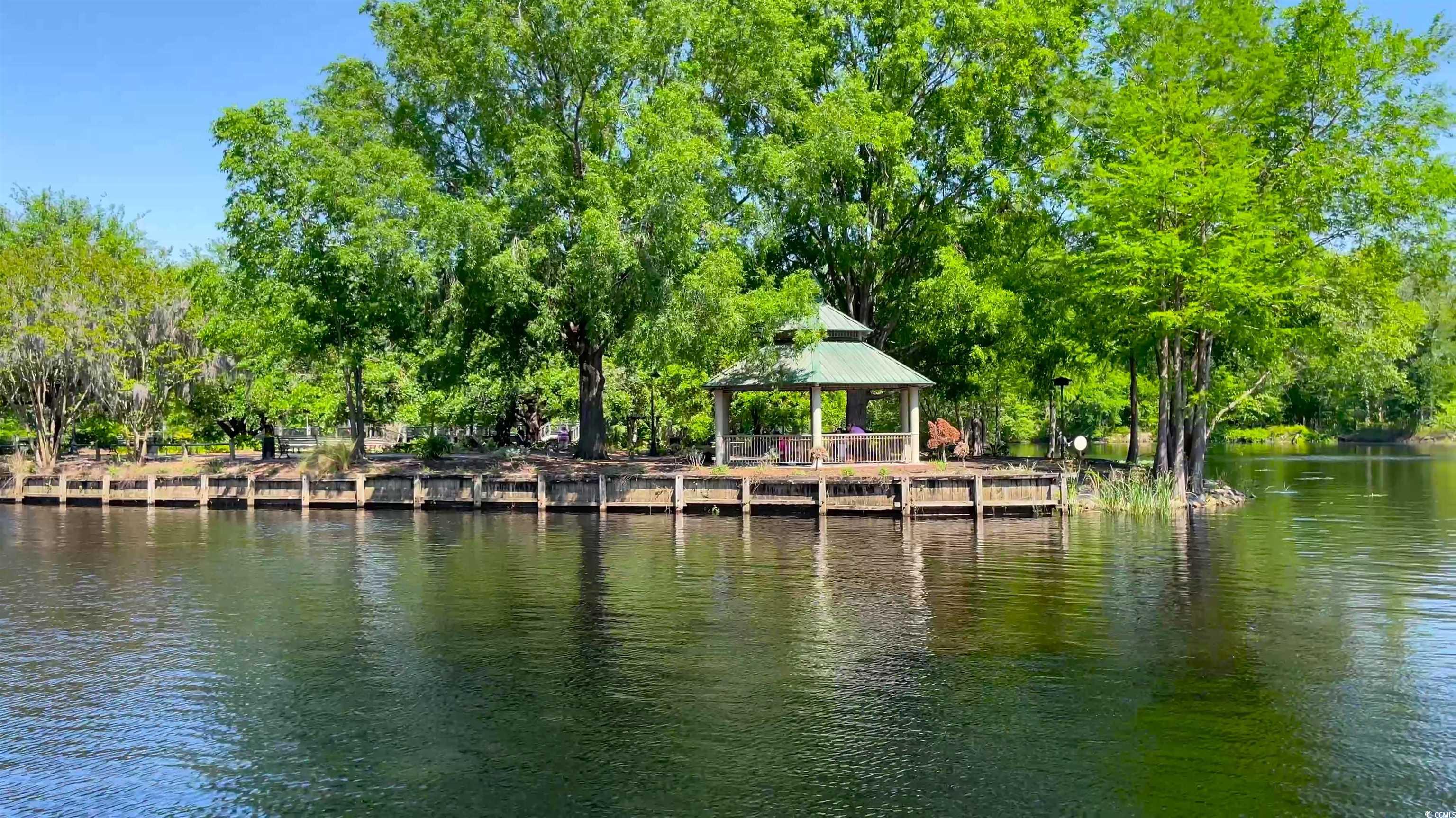 4675 Little River Neck Road North Myrtle Beach, SC 29582 - Photo 19 of 23 View of dock featuring a water view and a gazebo