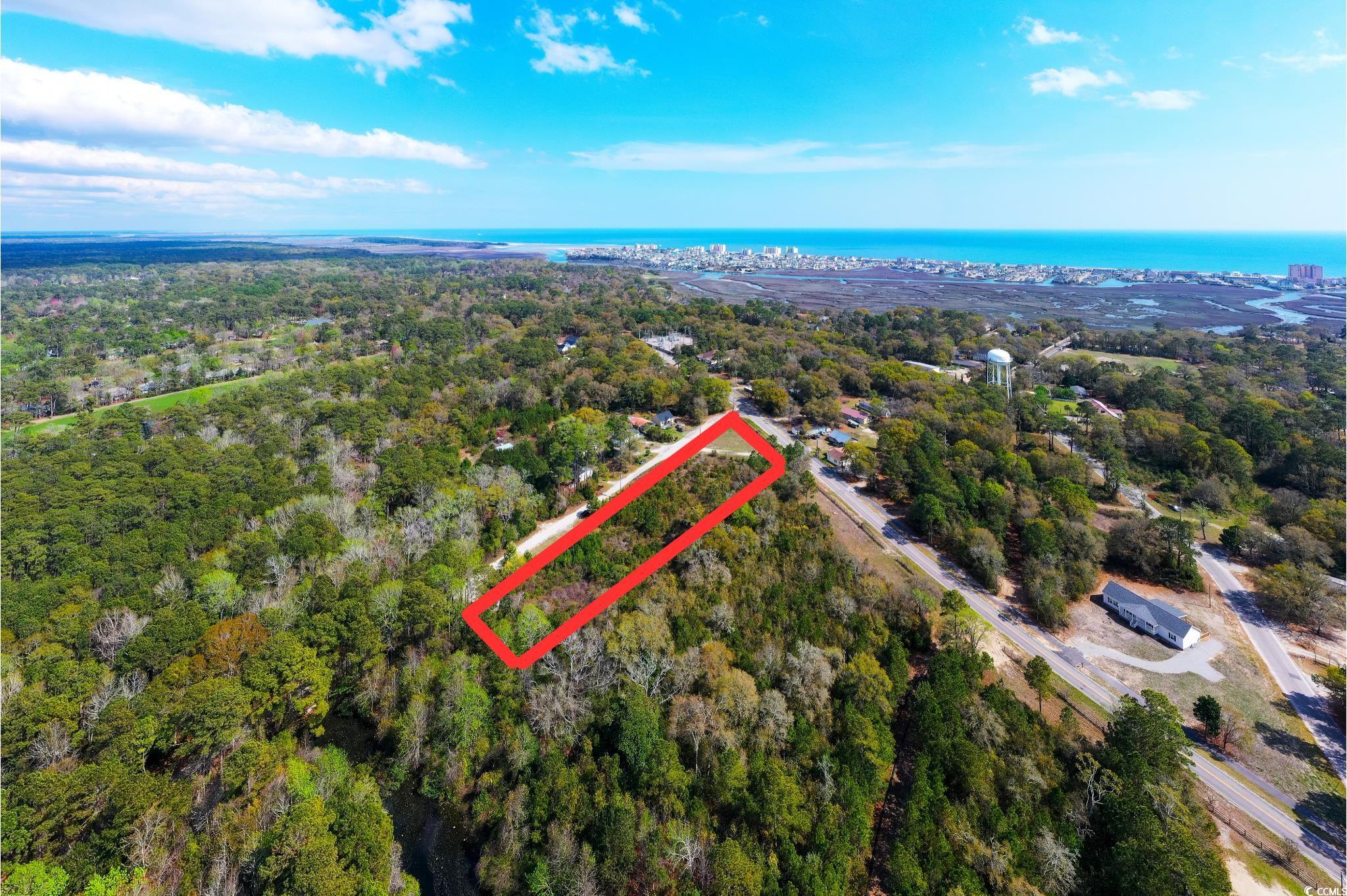 4675 Little River Neck Road North Myrtle Beach, SC 29582 - Photo 5 of 23 Drone / aerial view featuring a water view