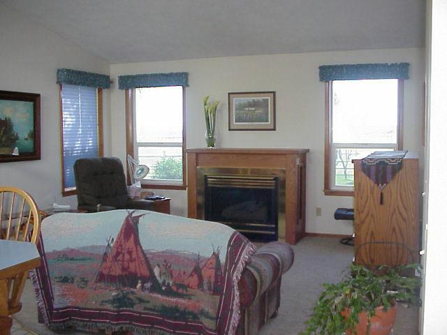 1791 Maple Grove Road Sunnyside, WA 98944 - Photo 3 of 8 a living room with furniture and a fireplace