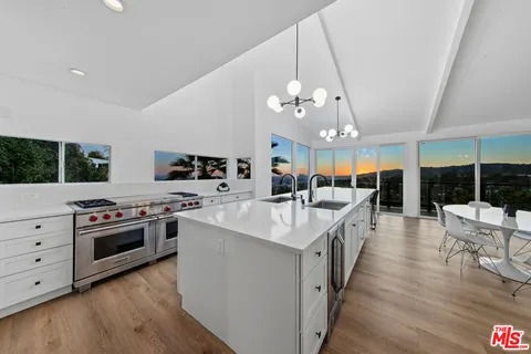 a view of a hall with wooden floor