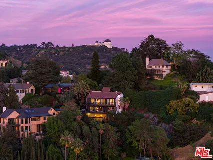 a view of a city with sunset