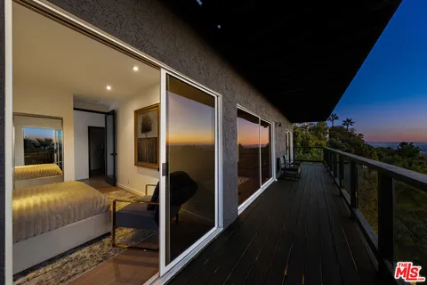 a bathroom with a double vanity sink and mirror