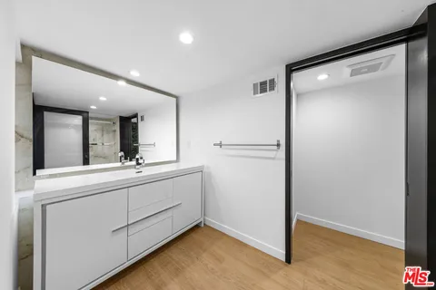 a view of a balcony with a tree