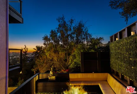 a view of balcony with chairs