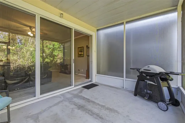 a view of room with furniture and windows