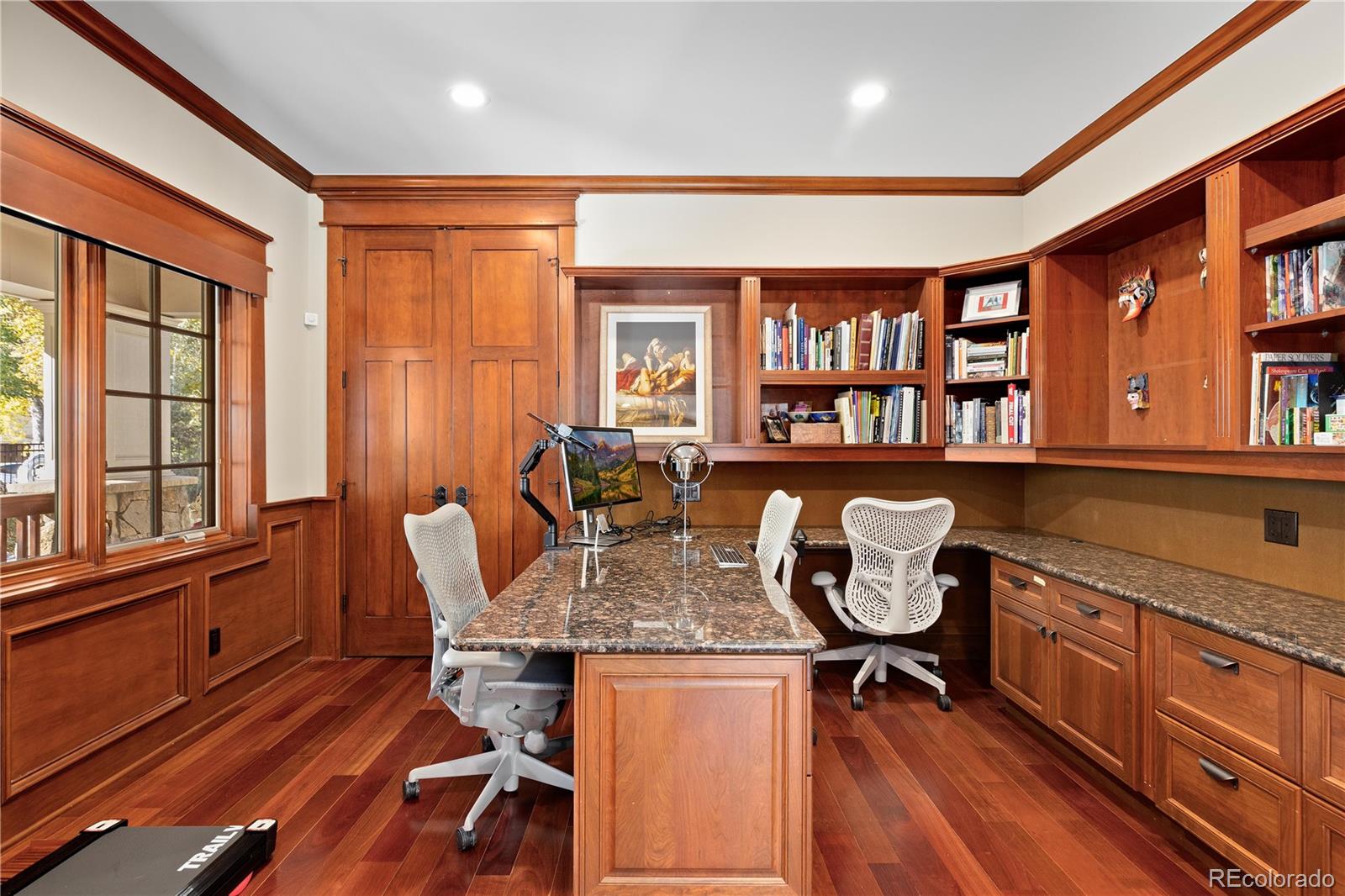 800 Grant Place Boulder, CO 80302 - Photo 15 of 50 a dining room with wooden floor and a window
