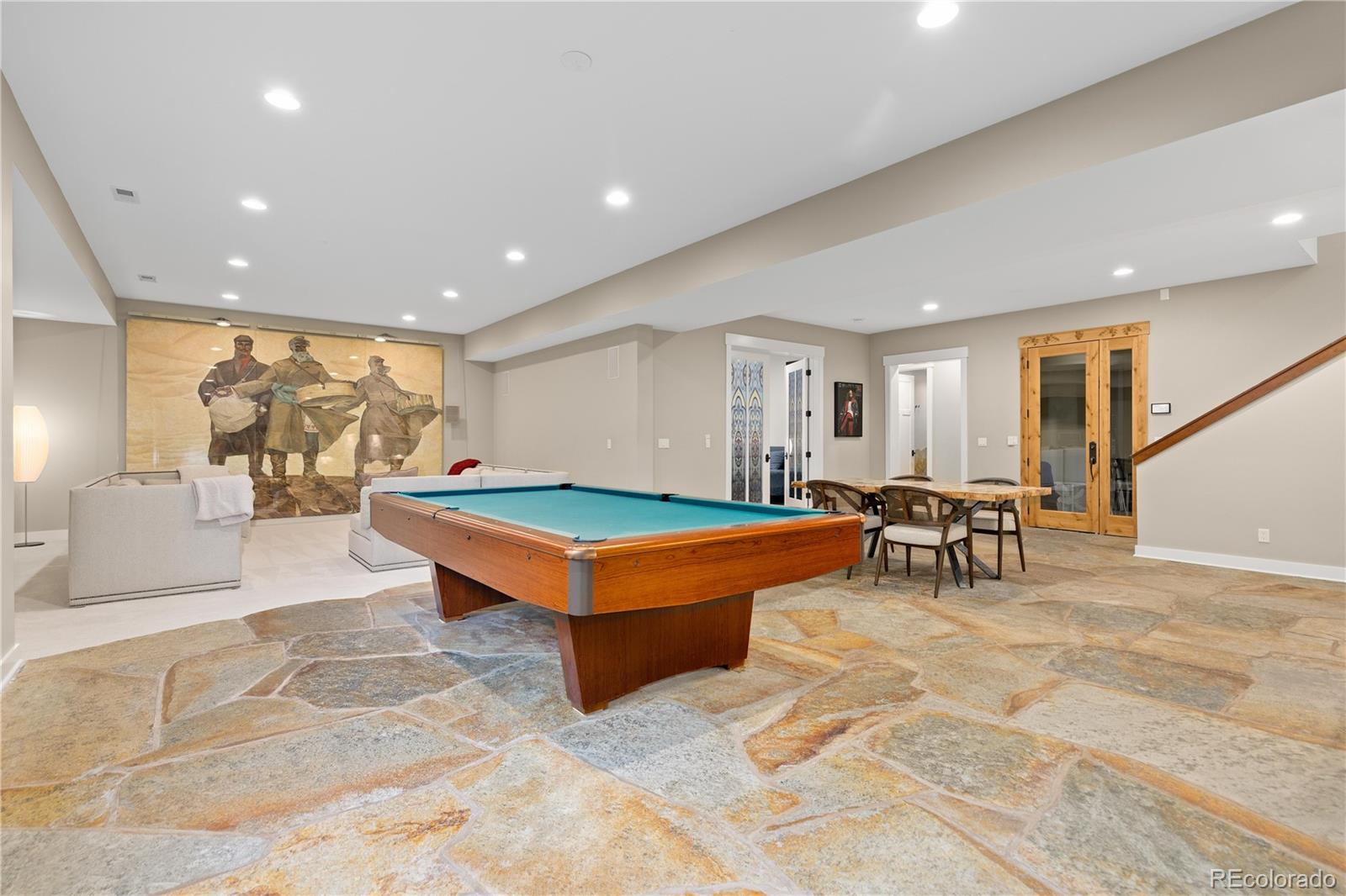 800 Grant Place Boulder, CO 80302 - Photo 20 of 50 a living room with furniture a table and kitchen view