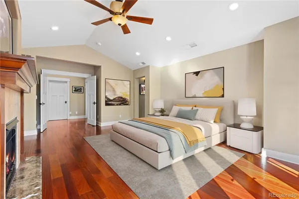 a view of a balcony with wooden floor and fence