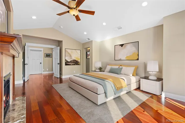 a view of a balcony with wooden floor and fence