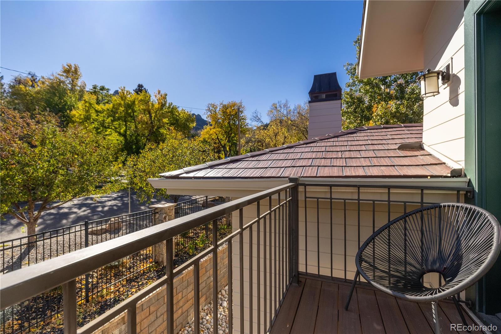 800 Grant Place Boulder, CO 80302 - Photo 30 of 50 a view of a balcony with wooden floor and fence
