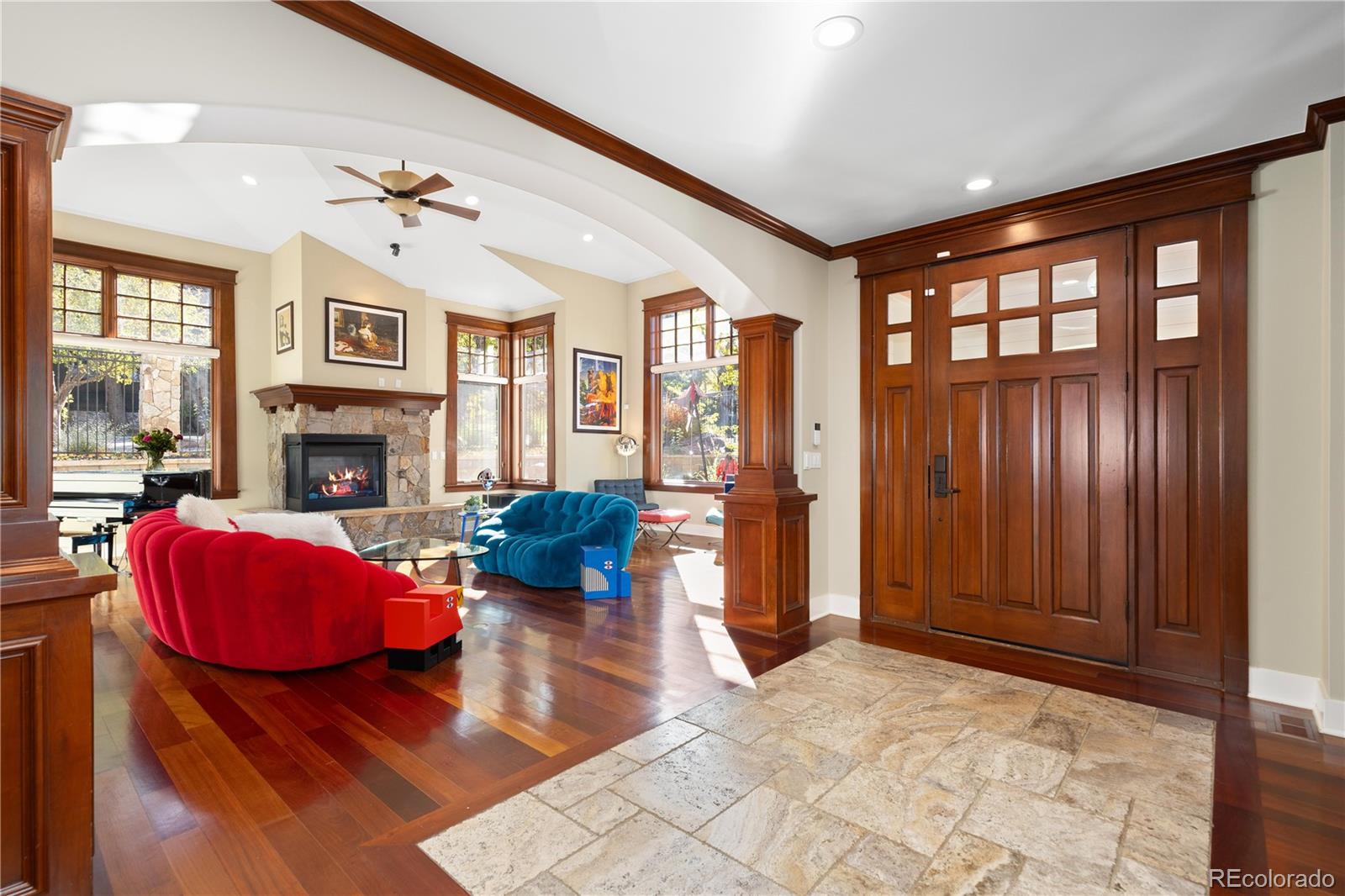 800 Grant Place Boulder, CO 80302 - Photo 3 of 50 a living room with furniture fireplace and flat screen tv