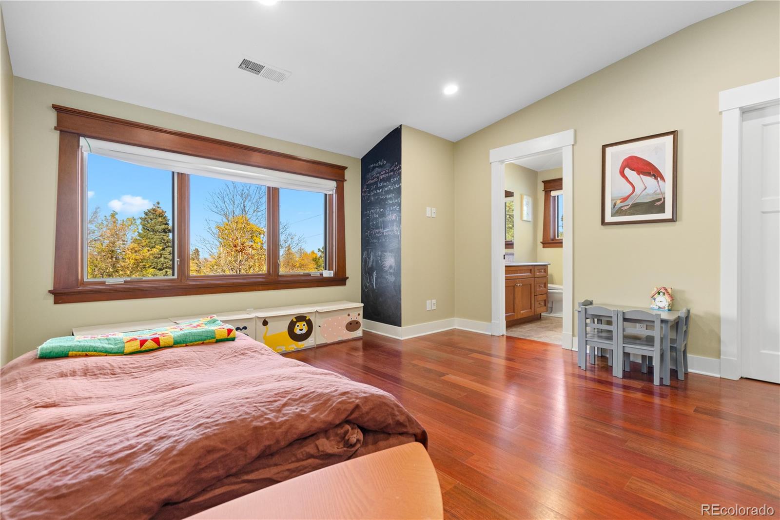 800 Grant Place Boulder, CO 80302 - Photo 33 of 50 a bedroom with furniture and wooden floor