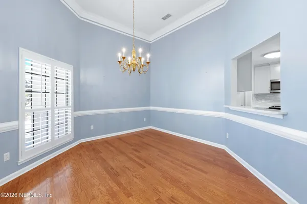 a bathroom with a shower sink vanity mirror and toilet