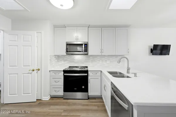 a view of small space with wooden floor