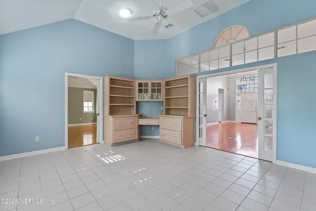 a view of an empty room and window