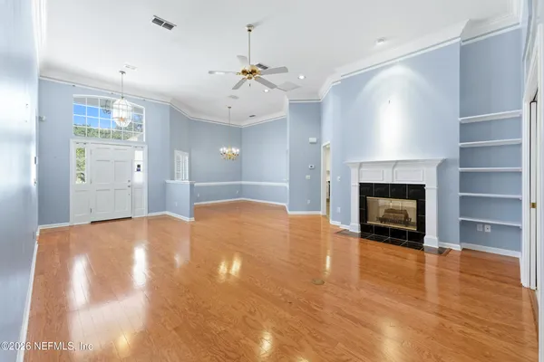 a bathroom with a shower sink vanity and mirror