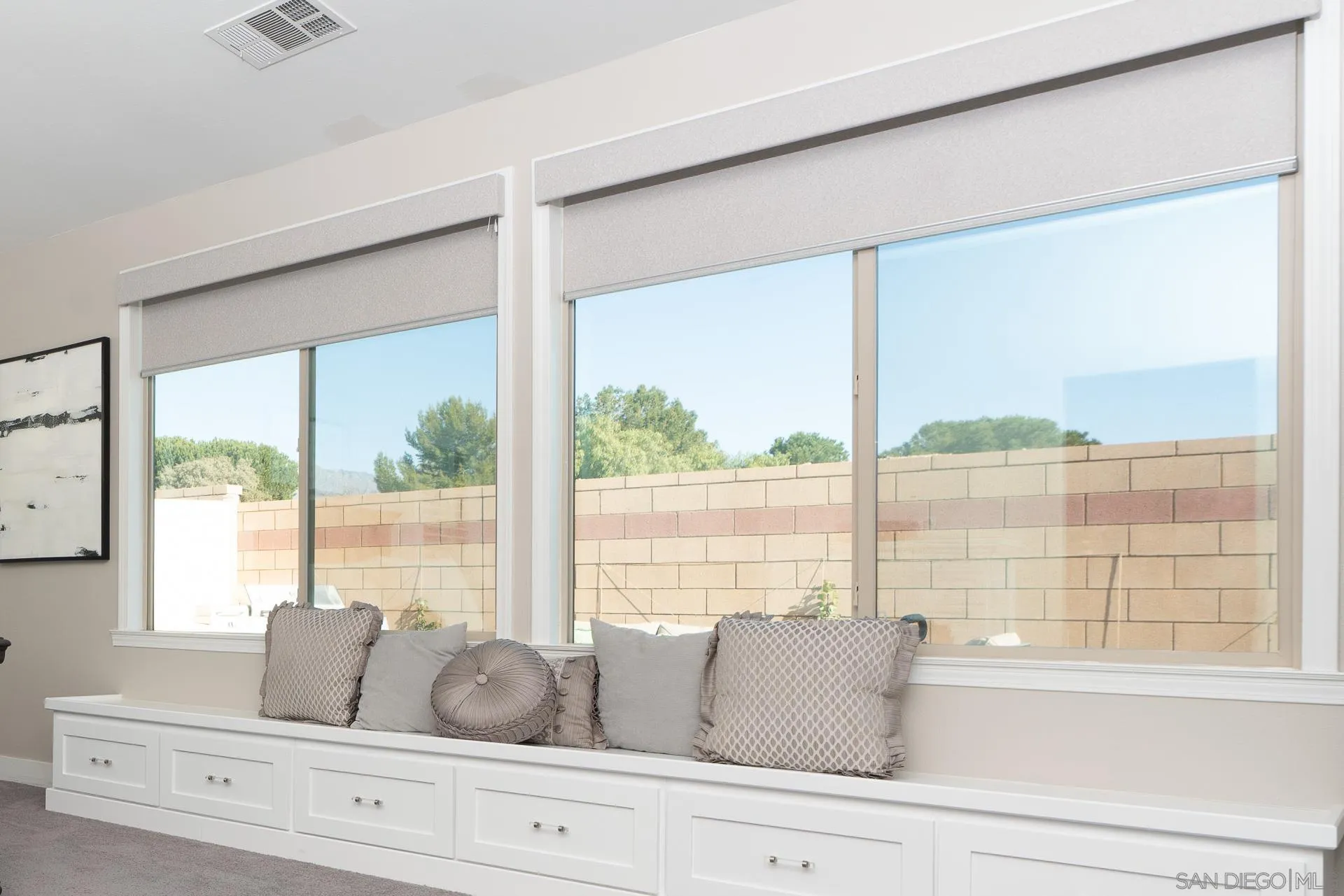 1712 Starlight Avenue Beaumont, CA 92223 - Photo 25 of 69 a living room with furniture and a large window