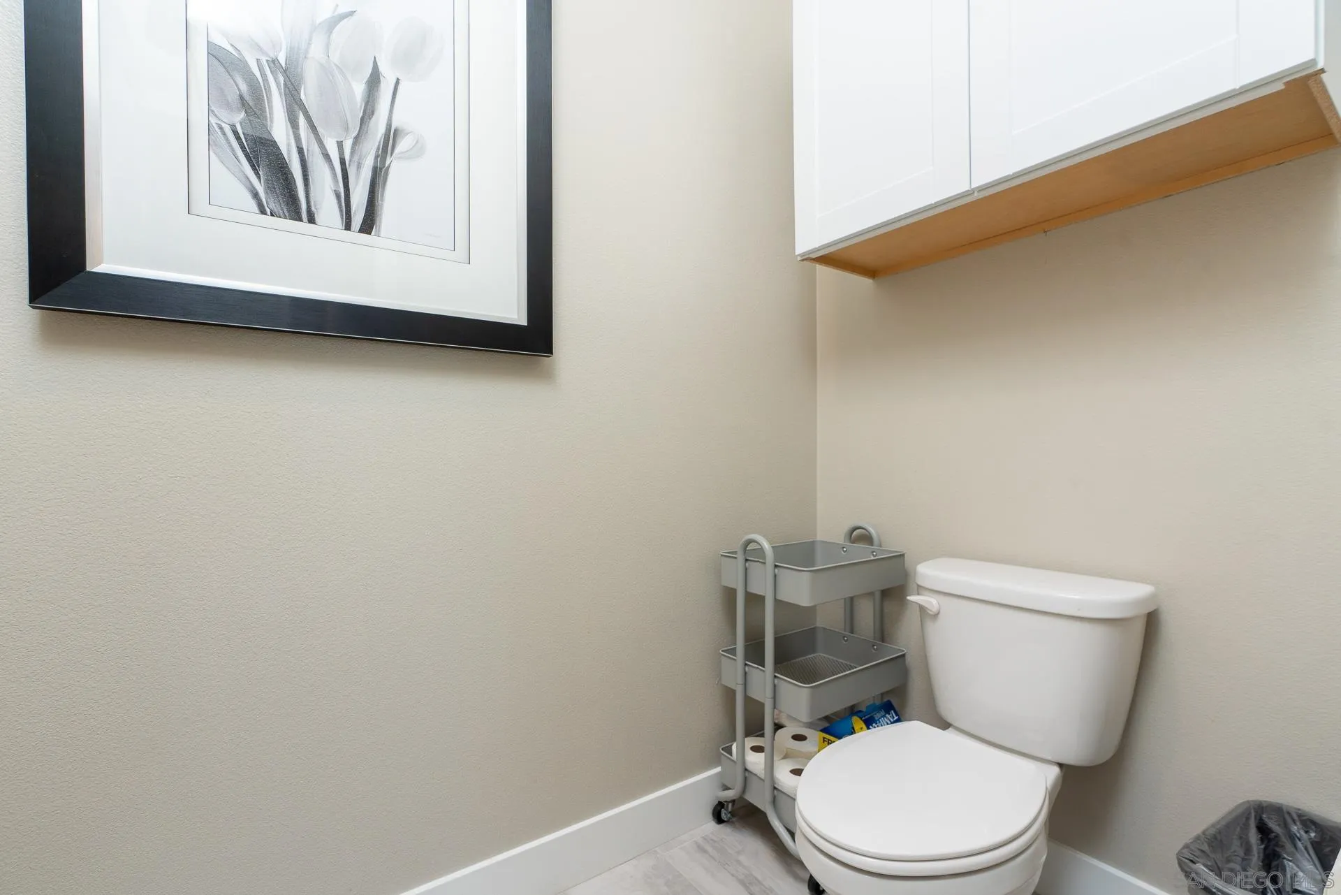 1712 Starlight Avenue Beaumont, CA 92223 - Photo 28 of 69 a white toilet sitting next to a white wall