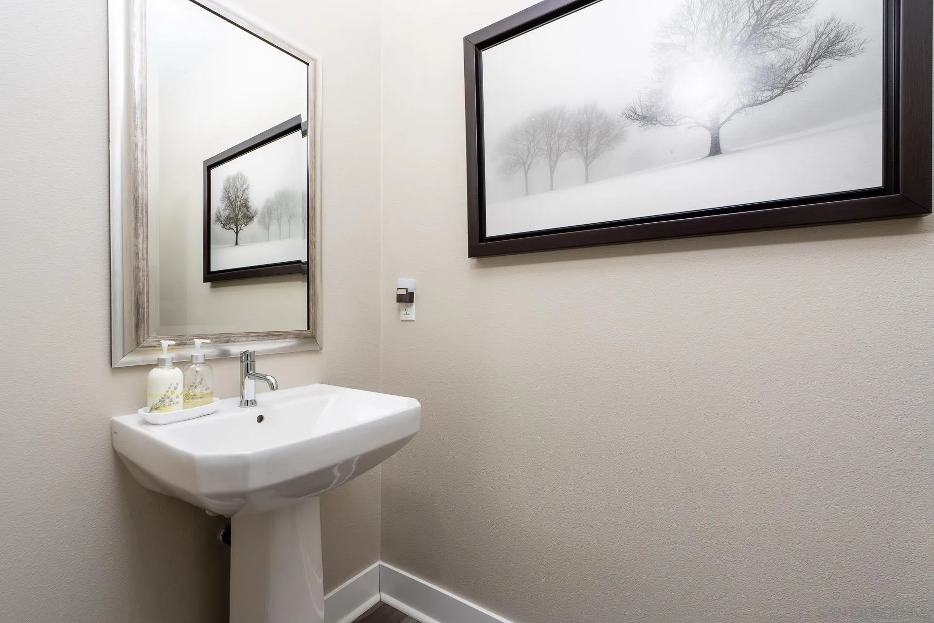 1712 Starlight Avenue Beaumont, CA 92223 - Photo 41 of 69 a bathroom with a sink and a mirror