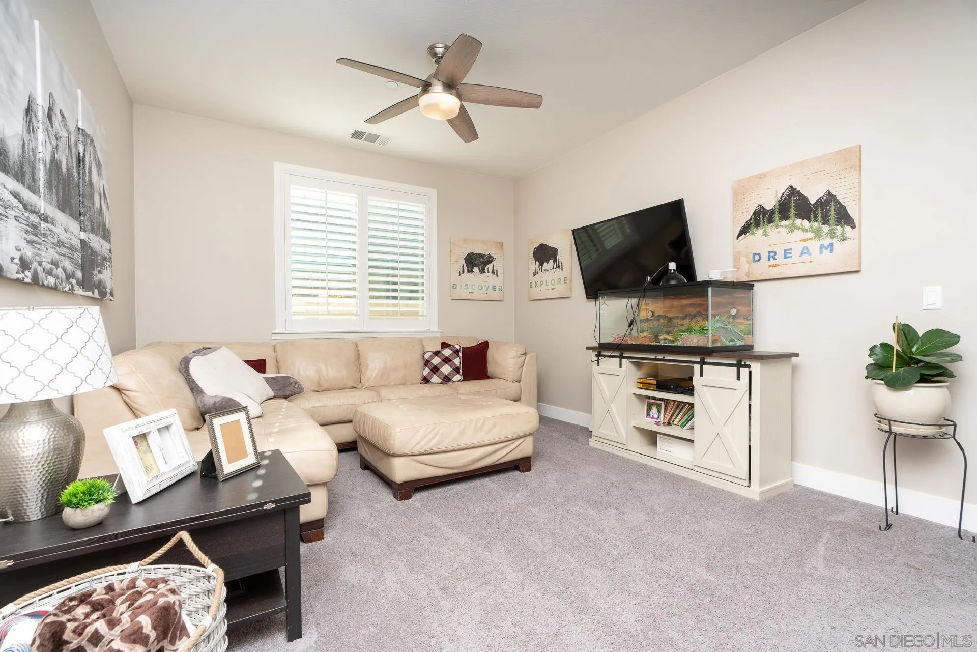 1712 Starlight Avenue Beaumont, CA 92223 - Photo 42 of 69 a bedroom with furniture and a flat screen tv