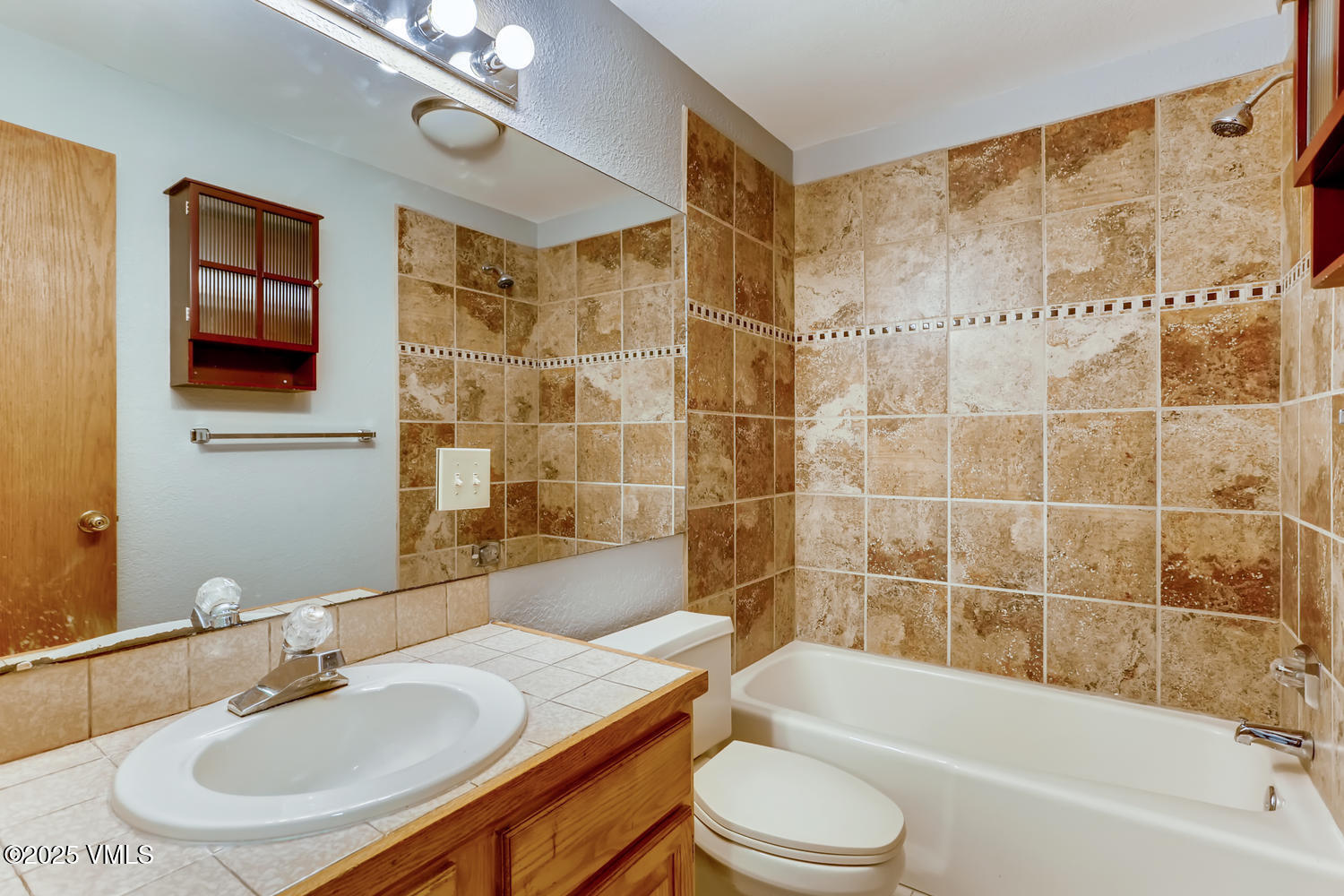 4595 Big Horn Road, Unit 5 Vail, CO 81657 - Photo 51 of 52 a bathroom with a sink toilet and shower