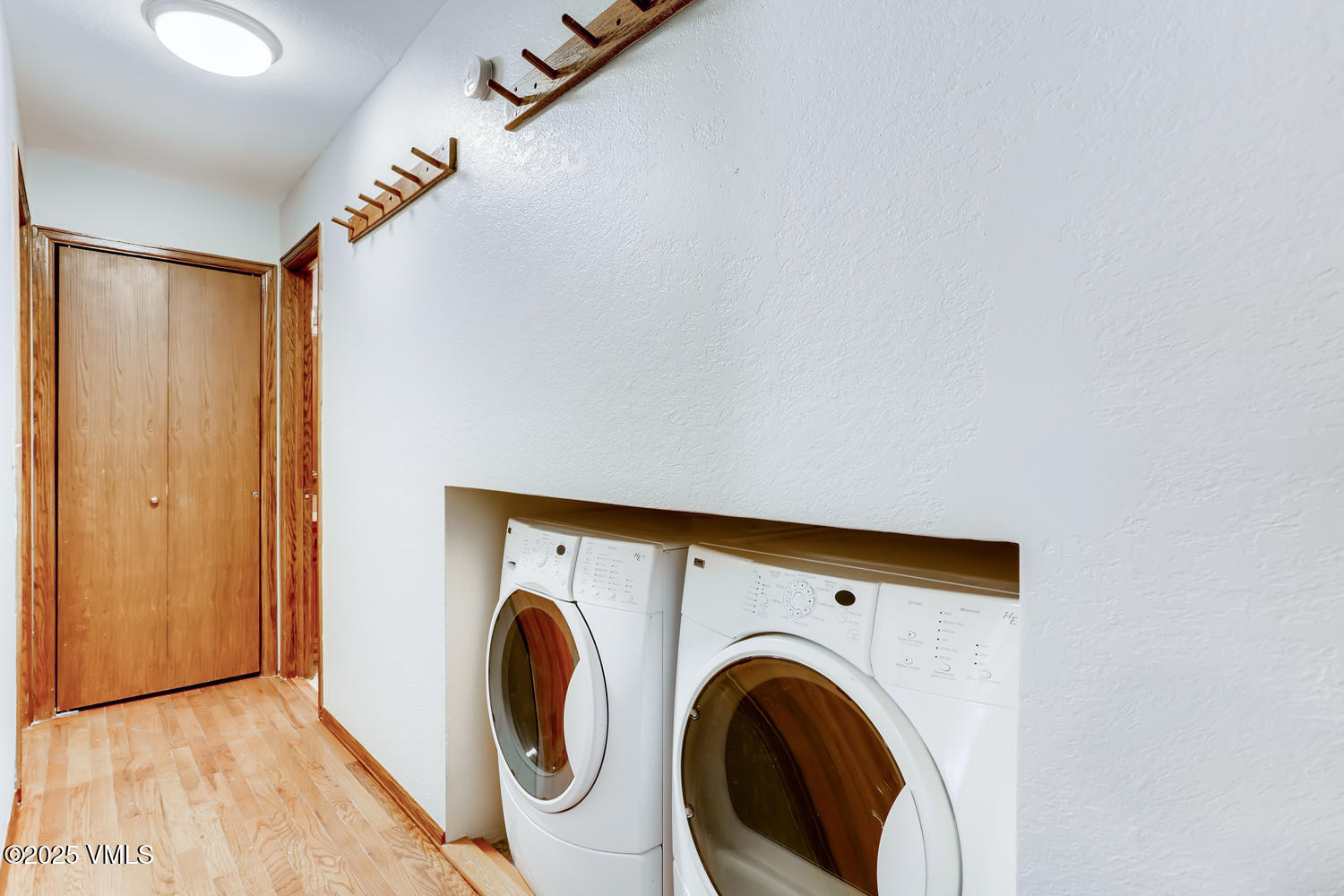 4595 Big Horn Road, Unit 5 Vail, CO 81657 - Photo 52 of 52 a utility room with dryer and washer